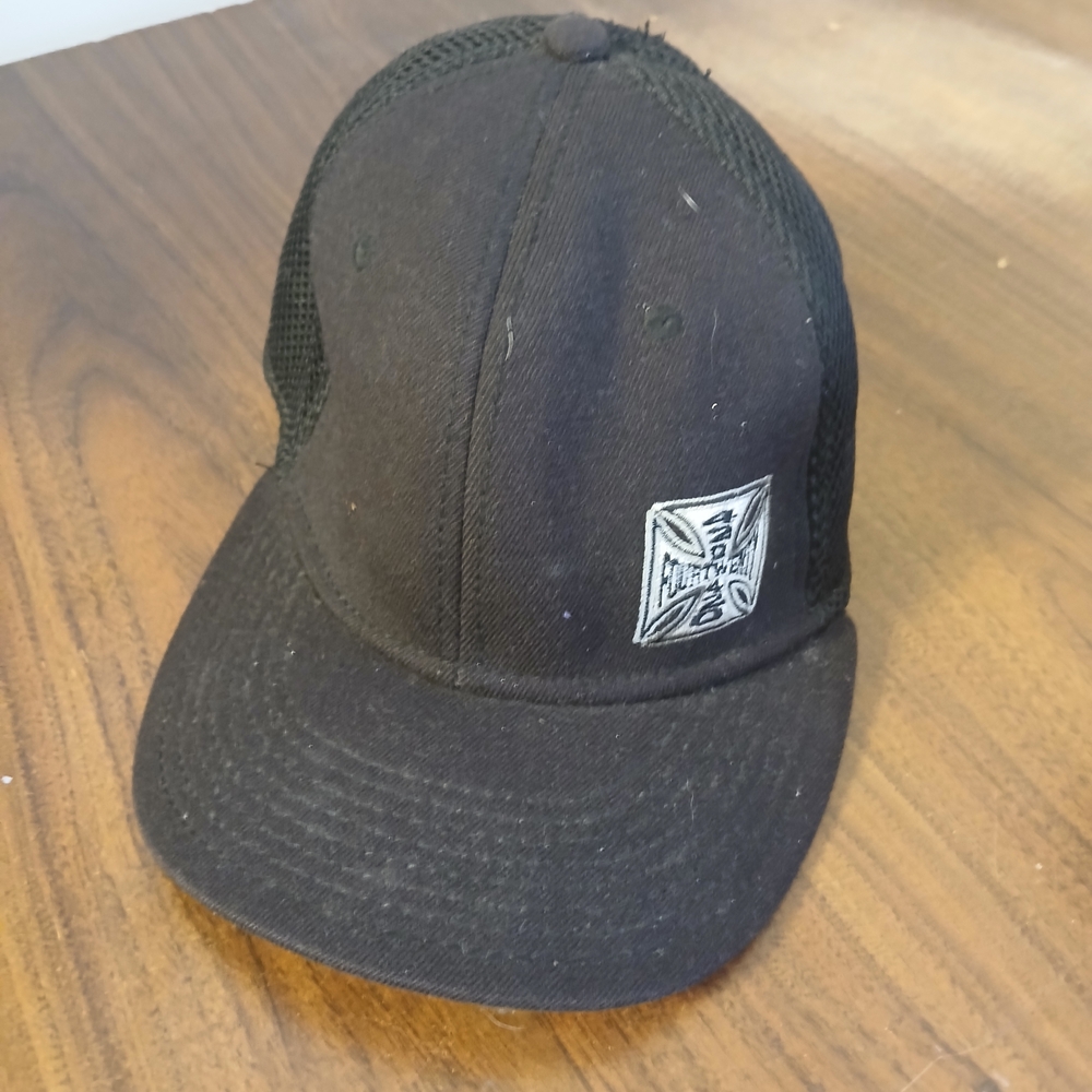 black mesh Flexfit Trucker hat featuring a 420 Headwear logo